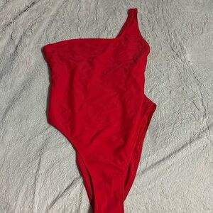 Never worn single strap one piece bathing suit!